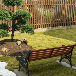 Parkbank model Oslo van gietijzer. Hier is gekozen voor het inbetonneren van de bankvoeten