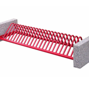 Design fietsenrek, rijwielstandaard model Alfa. Afgewerkt in een frisse rode poedercoating. Door de zware betonvoeten kunnen deze fietsenrekken vrijstaand geplaatst worden.